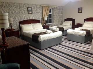 Отели типа «постель и завтрак» Killarney Inn Килларни Улучшенный семейный номер-7
