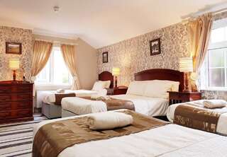 Отели типа «постель и завтрак» Killarney Inn Килларни Улучшенный семейный номер-11